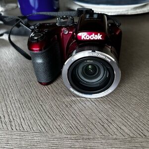 Kodak Metallic Red Bridge Camera with Black Grip and Silver Lens Ring